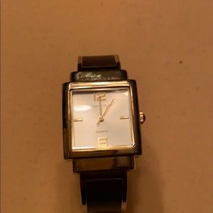 Bracelet watch with leather and gold